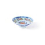 A Chinese blue and white 'Famille Rose' and iron red cover for a bowl, Qianlong