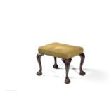 A carved mahogany stool in George III Irish style, late 19th century