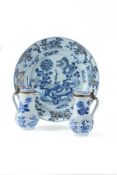 A pair of Chinese blue and white ewers and covers, Kangxi