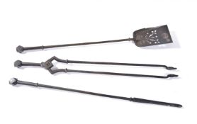 A set of Victorian steel fire irons in Gothic manner, circa 1860