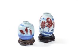 Two Chinese modern ovoid vases painted in blue and terracotta with birds in landscapes