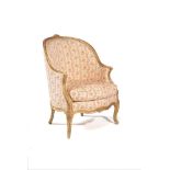 A Louis XV carved giltwood and composition Bergere armchair