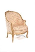 A Louis XV carved giltwood and composition Bergere armchair