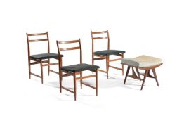 A set of three mid century wooden dining chairs