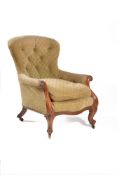 A Victorian walnut and button upholstered armchair, circa 1870