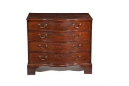 A George III mahogany and crossbanded serpentine chest, circa 1770
