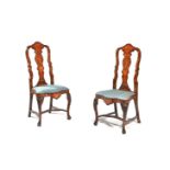 A pair of Dutch walnut and marquetry inlaid side chairs in 18th century style