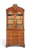 A walnut and featherbanded cabinet on chest, first half 18th century and later