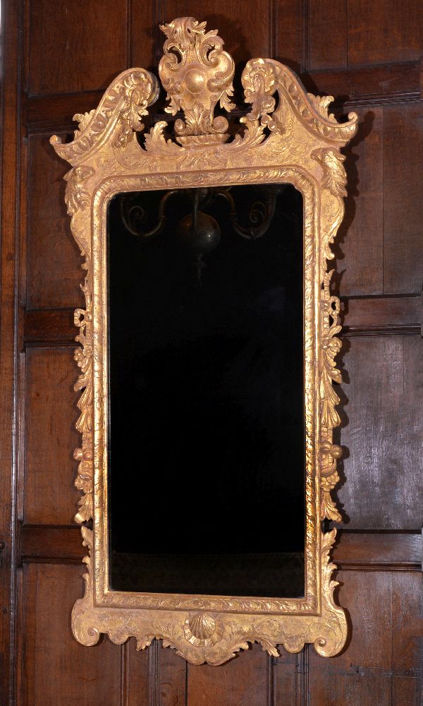 A George I giltwood wall mirror, circa 1720