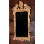 A George I giltwood wall mirror, circa 1720