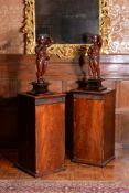 A pair of George III mahogany dining room pedestal cupboards