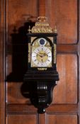 A Queen Anne/George I gilt brass mounted ebony quarter chiming table clock