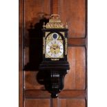 A Queen Anne/George I gilt brass mounted ebony quarter chiming table clock