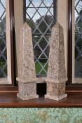 A pair of polished fossil marble obelisks