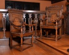 A pair of oak armchairs, in 17th century style