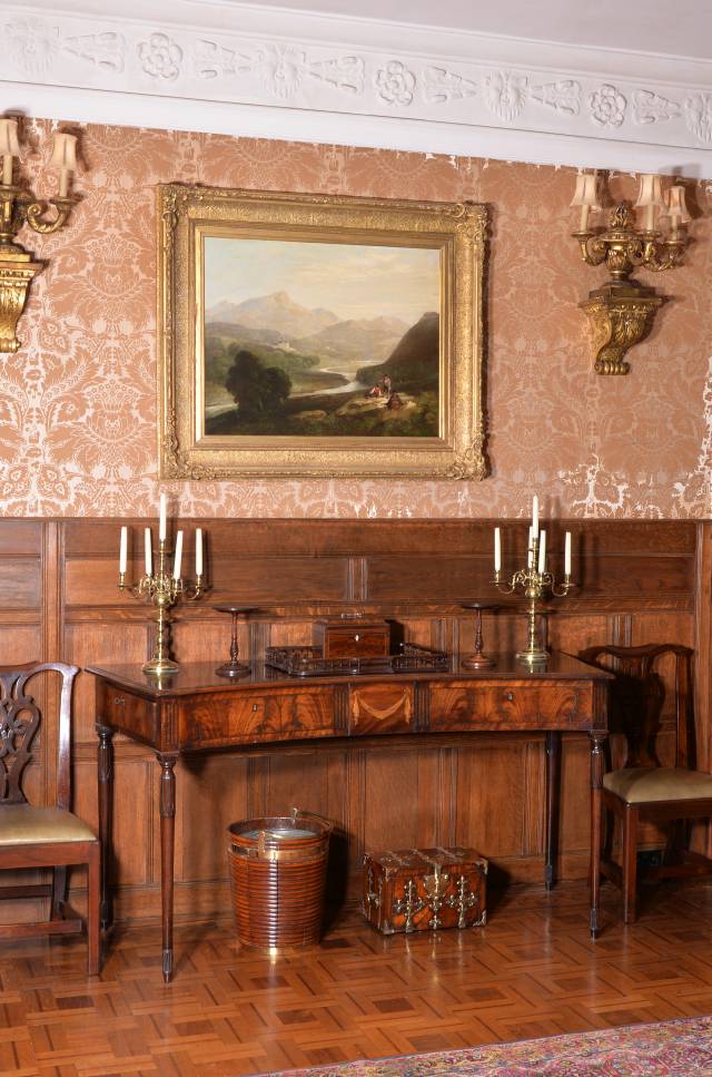 A George III mahogany concave fronted serving table