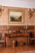 A George III mahogany concave fronted serving table