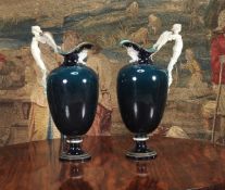 A pair of Wedgwood majolica ewers