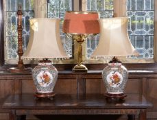 A pair of Limoges porcelain table lamps in Oriental taste