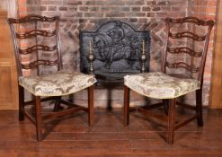 A pair of George III mahogany chairs