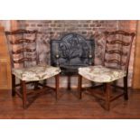 A pair of George III mahogany chairs