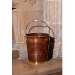 A George III mahogany peat bucket, circa 1780