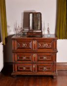 A Charles II oak chest of drawers