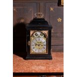 A George I gilt metal mounted ebonised table clock