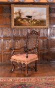 A Charles II carved walnut armchair, circa 1680