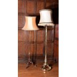 A gilt metal columnar standard lamp in Victorian style