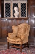 A George III mahogany wing armchair, circa 1780