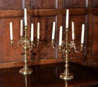 A pair of gilt metal five light candelabra in Dutch early 18th century style