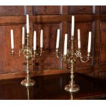 A pair of gilt metal five light candelabra in Dutch early 18th century style