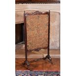 A George III mahogany and needlework screen