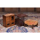 A mahogany table top revolving bookcase