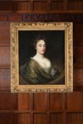 Circle of Sir Godfrey Kneller (British 1646 - 1723) Portrait of a lady with a green cloak