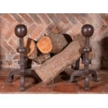 A pair of substantial painted cast iron andirons in Mediaeval taste