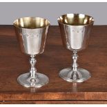 A pair of silver goblets by A. Haviland-Nye