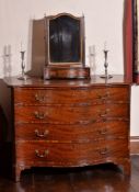 A George III mahogany serpentine fronted dressing chest of drawers