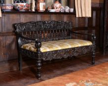 A Ceylonese solid ebony settee