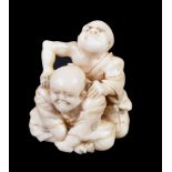 ϒ MASAYOSHI: An Ivory Japanese Netsuke of a blind masseur kneeling