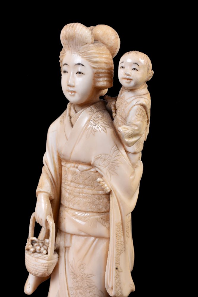 ϒ A Japanese Ivory Okimono of a Farmer with matchlock rifle - Image 2 of 11