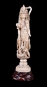 ϒ A Japanese sectional ivory Okimono of Guanyin