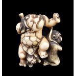 ϒ An Ivory Japanese Netsuke carved as the young Kintaro