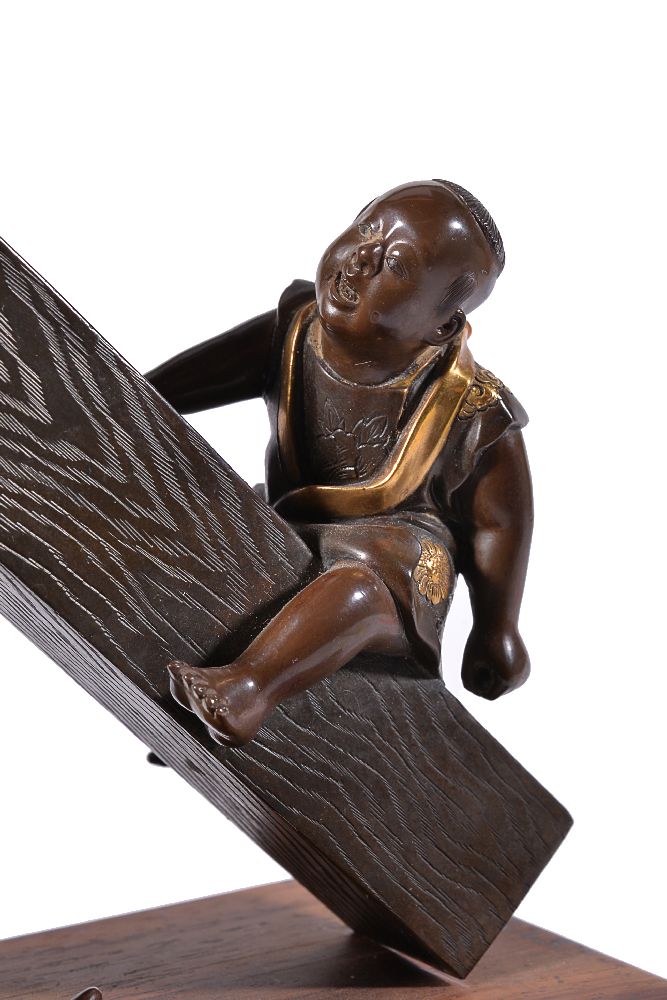 Miya-O Eisuke: A Japanese Parcel Gilt Bronze Group of a Carpenter and Boy - Image 5 of 7