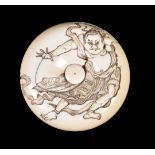 ϒ ISSHOSAI HAKUMIN: A Japanese Ivory Manju Netsuke of typical circular form with later replacement