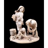 ϒ KIKKOSAI TOKUSAN: A Japanese Ivory Okimono depicting a family group