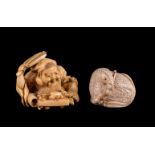 ϒ A Japanese Ivory Netsuke of a seated quail