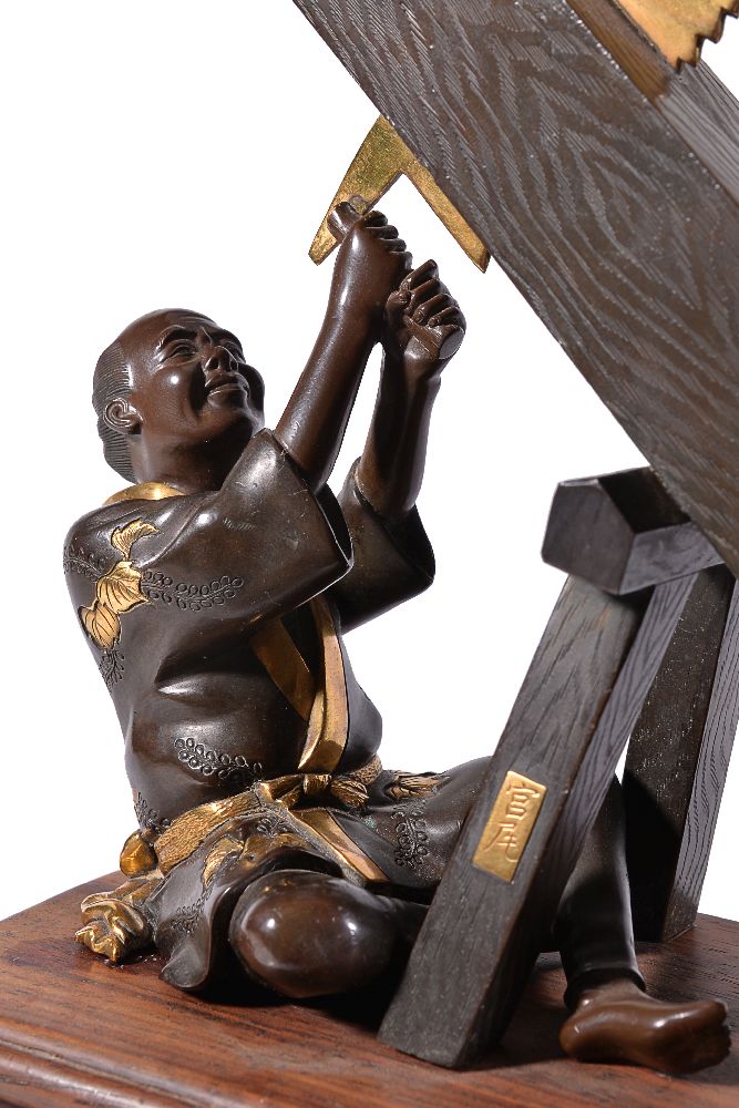 Miya-O Eisuke: A Japanese Parcel Gilt Bronze Group of a Carpenter and Boy - Image 3 of 7