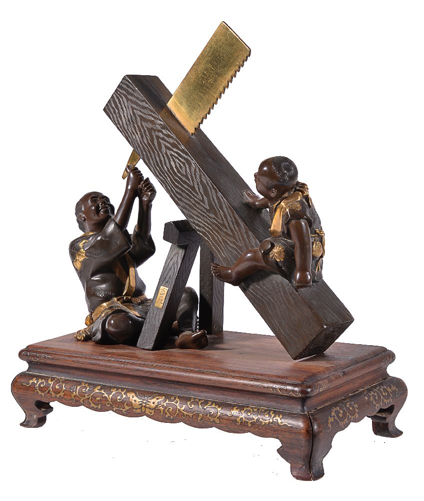 Miya-O Eisuke: A Japanese Parcel Gilt Bronze Group of a Carpenter and Boy - Image 2 of 7